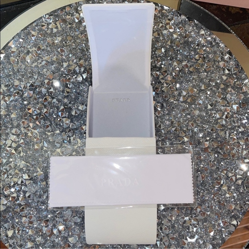 White Leather Sunglasses Case W/ New In Plastic Wipey + Card
Prada
$85 - Picture 5 of 6